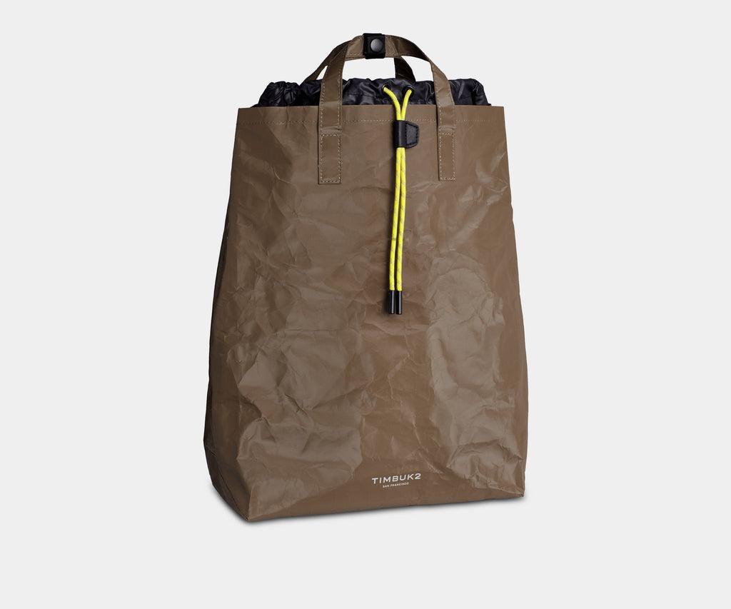 timbuk2 paper bag tote backpack Spirit Padded laptop sleeve fits most 15 laptops/tablets Tuckable straps to convert into a backpack Interior dual scratch Timbuk2 OS One Love San